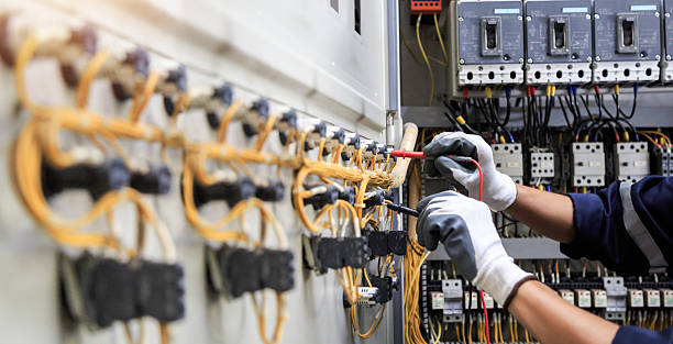 Professional Electrician technician working in Center Point, TX